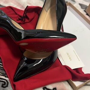 Christian Louboutin black heels -worn once!
